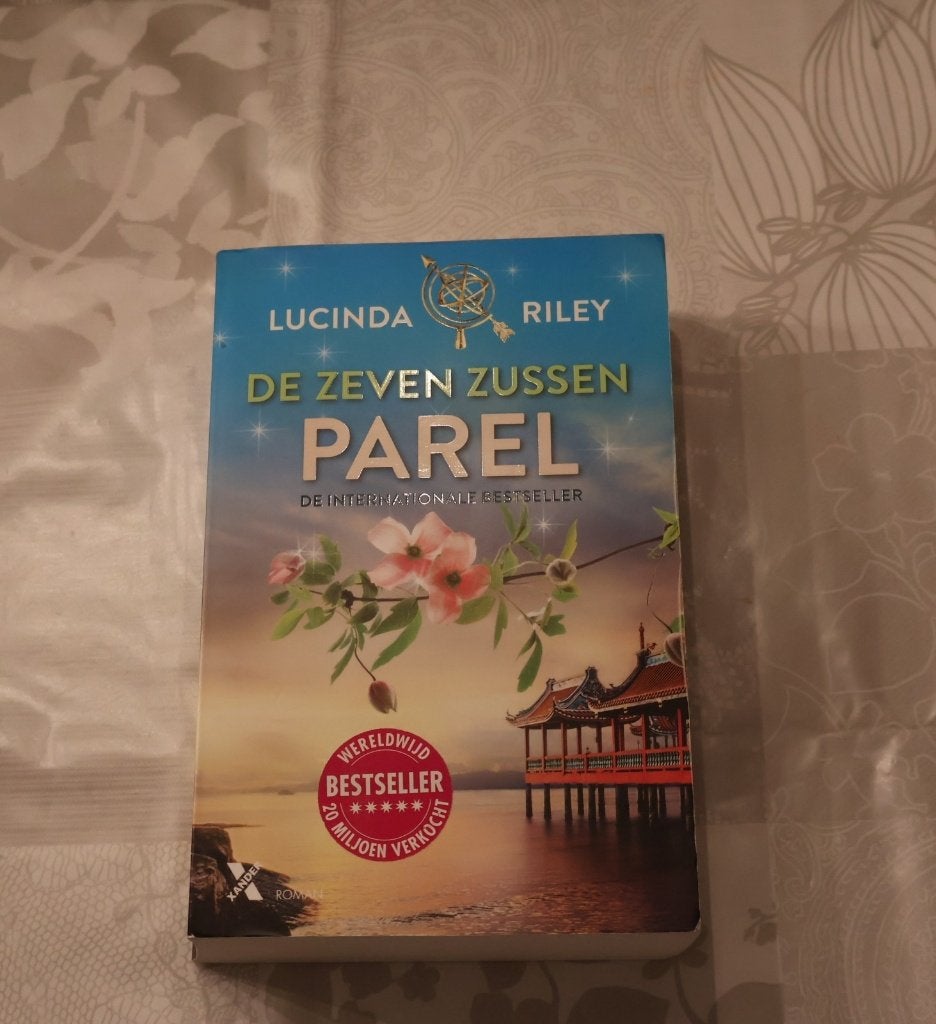 De zeven zussen Parel. Lucinda Riley., Boeken, Ophalen, Lucinda Riley, Zo goed als nieuw, Nederland