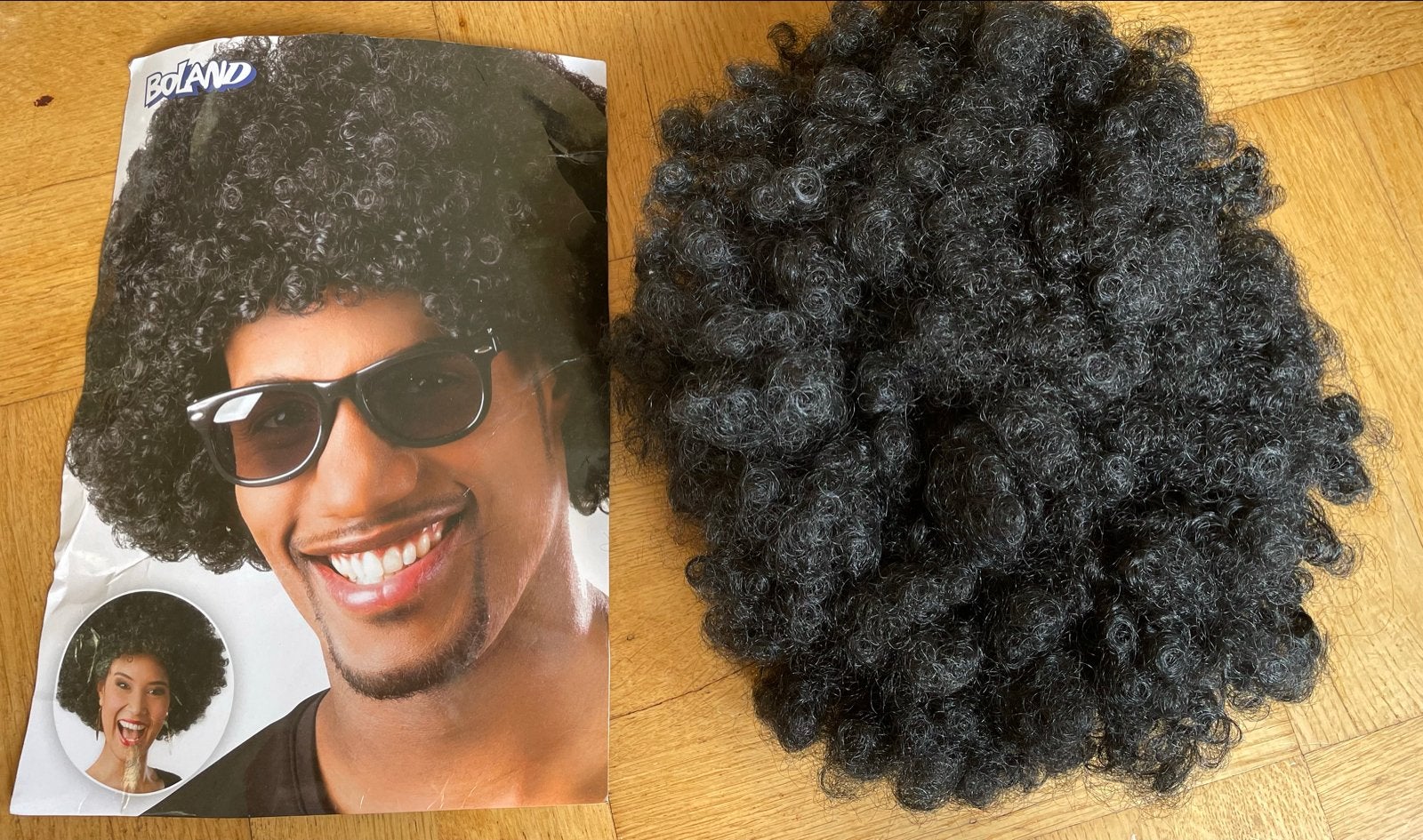 Afro Pruik Zwart - Feestpruik Carnaval Verkleedpartij, Ophalen of Verzenden, Zo goed als nieuw, Hoed of Pruik, Carnaval
