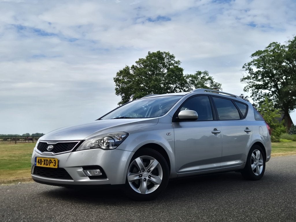 Kia cee'd Sporty Wagon 1.4 CVVT Nav.Pl.Pack (bj 2012), Auto's, Voorwielaandrijving, Euro 5, Gebruikt, 4 cilinders