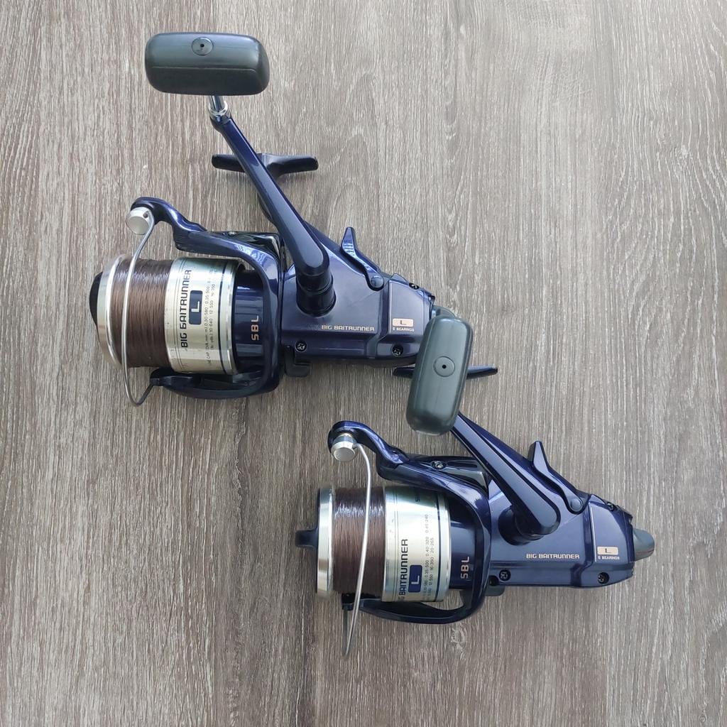 Shimano Baitrunner L 2x + boekjes, Ophalen of Verzenden, Shimano.com, Molen, Shimano