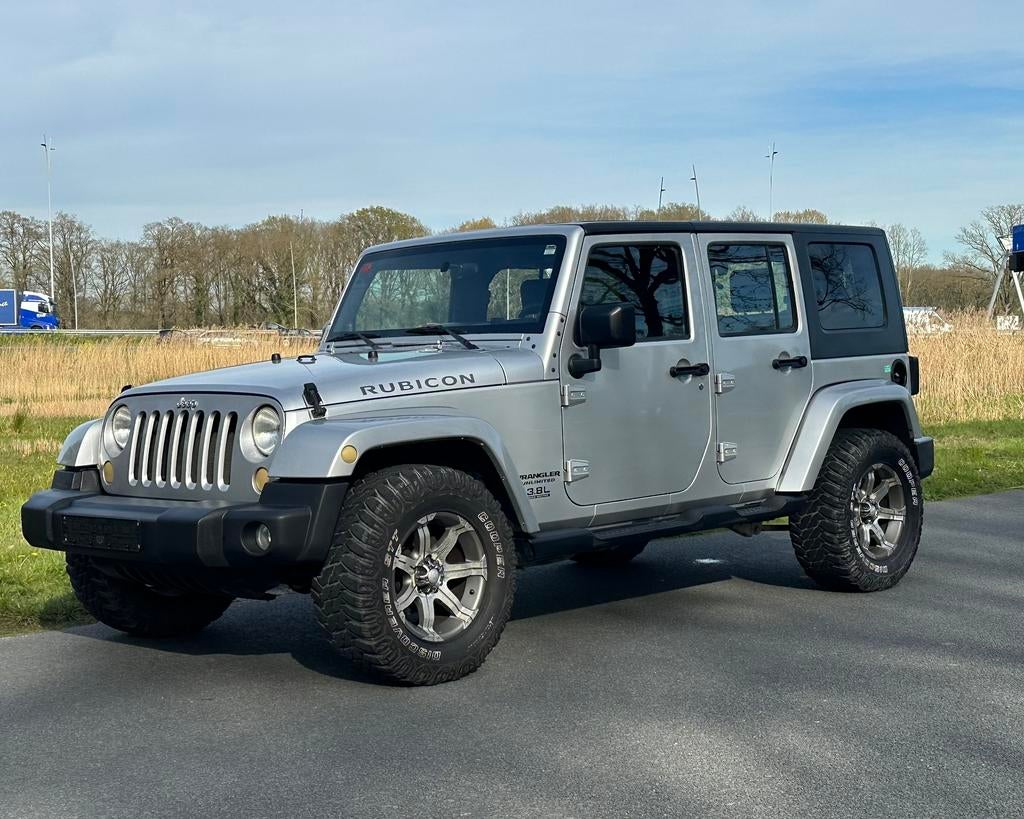 Jeep Wrangler 3.8L Unlimited Rubicon Cabrio Full options, Automaat, Zwart, Cabriolet, Leder