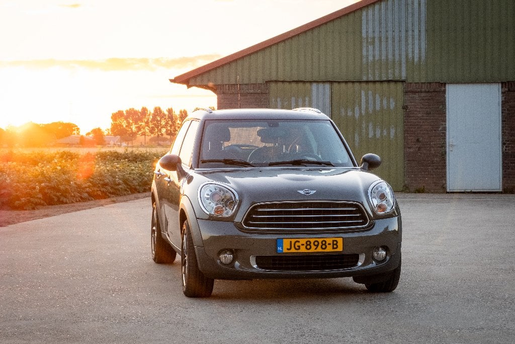Mini Countryman | leer | airco | 17” | bi-xenon | apk, Auto's, Mini, Voorwielaandrijving, Zwart, 4 stoelen, 98 pk