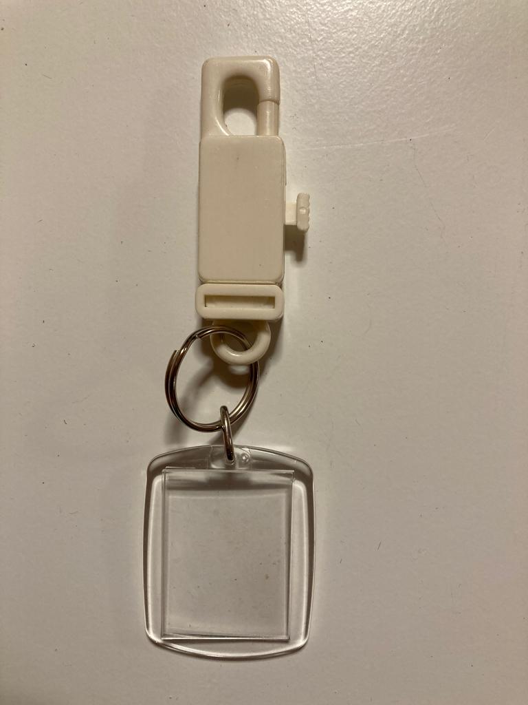 fotosleutelhanger / pasfotosleutelhanger, Ophalen of Verzenden, Zo goed als nieuw