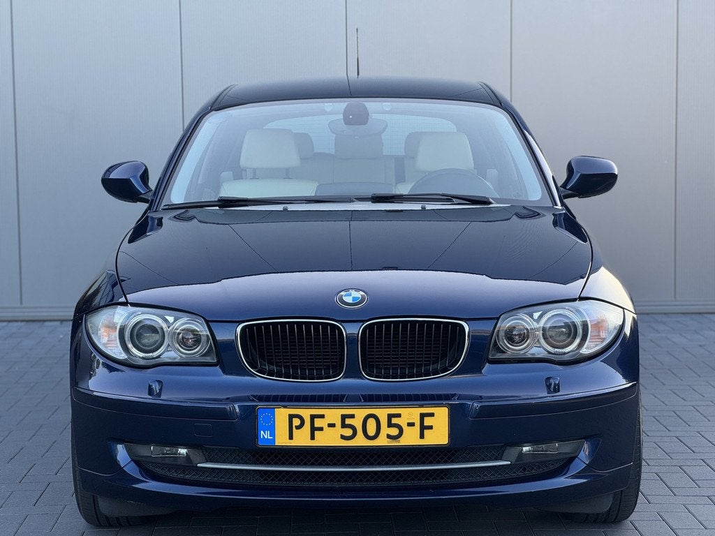 BMW 1-serie 118i High Executive | Xenon | Leder | Navigatie, Auto's, BMW, Euro 5, Blauw, Leder, 1275 kg