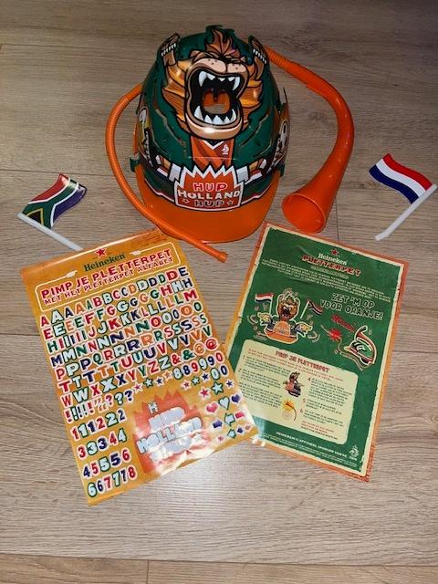 Heineken Pletterpet WK Voetbal 2010 Oranje Fanpakket, Ophalen of Verzenden, Gebruikt, Overige typen, Heineken