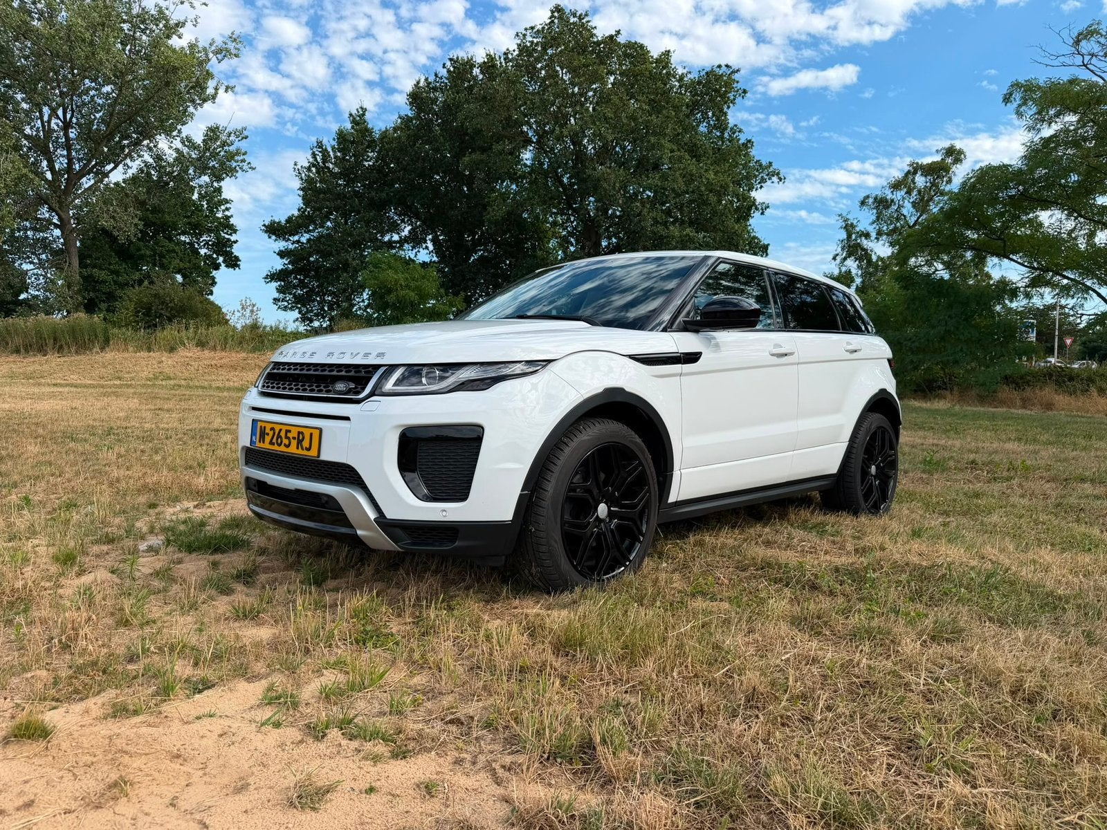 Land Rover Range Rover Evoque 2.0 Si4 240pk 4WD Aut 2017 Wit, Auto's, Automaat, 1800 kg, 4 cilinders, Wit