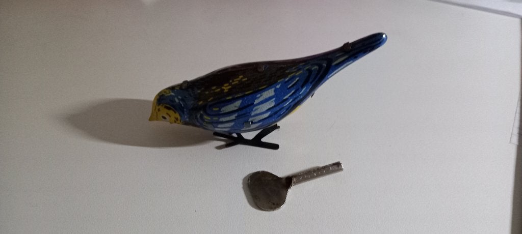 Blikken vogeltje met opwind sleutel., Ophalen of Verzenden, Gebruikt