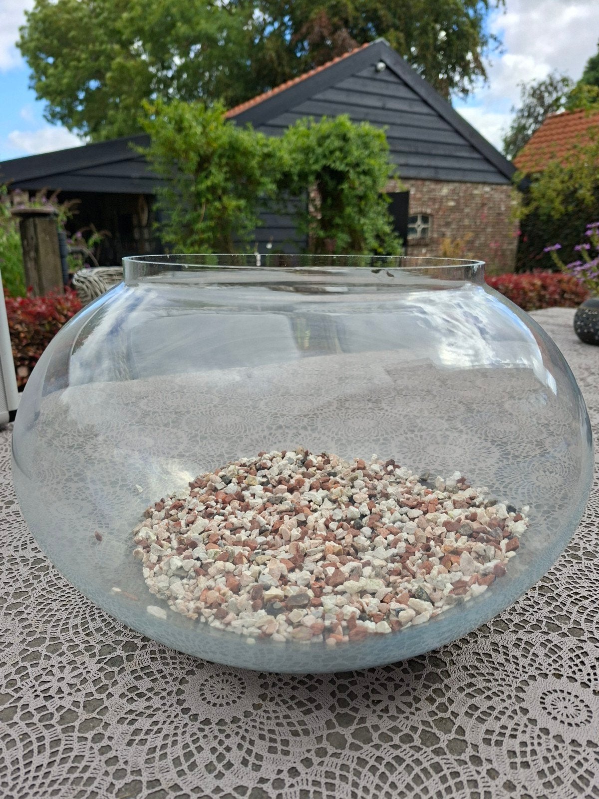 Grote glazen vissenkom, Ophalen