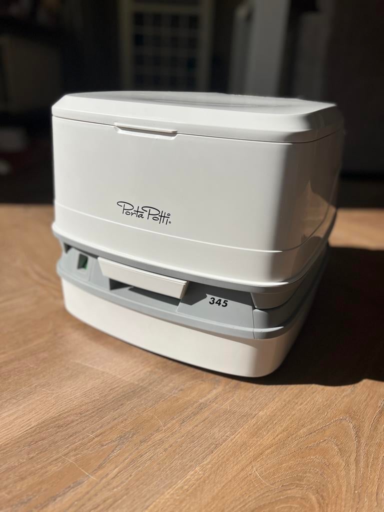 Porta Potti 345, Ophalen, Zo goed als nieuw