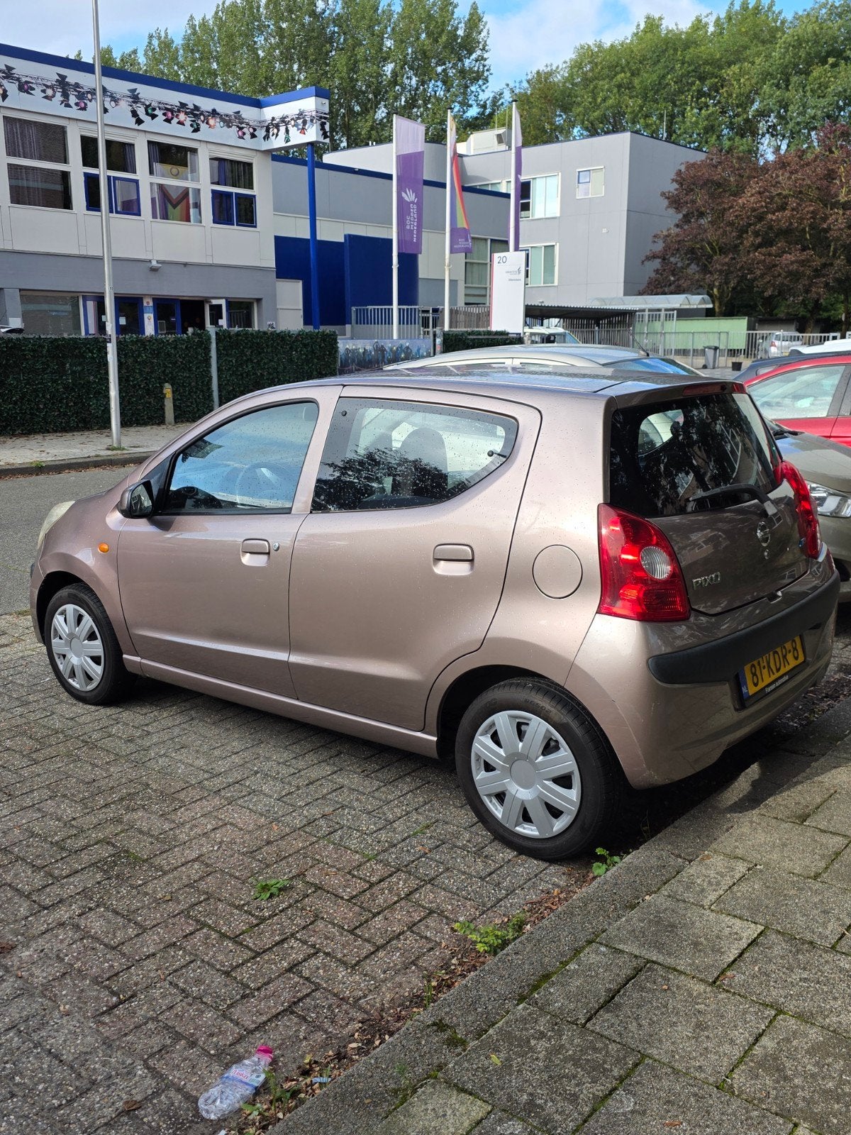 Nissan Pixo 1.0 50KW 5D 2009 Beige, Auto's, Voorwielaandrijving, 4 stoelen, Origineel Nederlands, Handgeschakeld