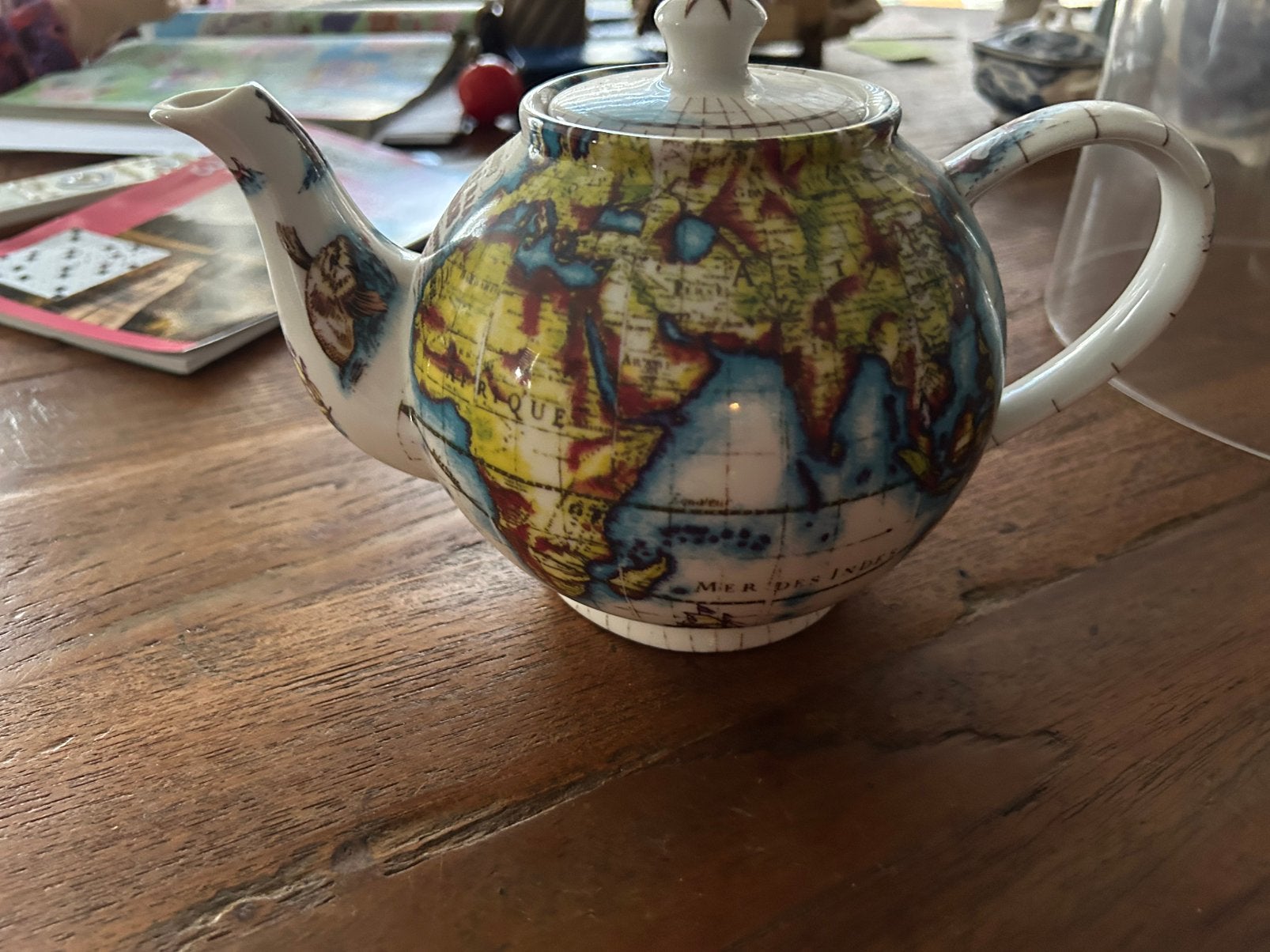 Theepot wereldbol, Ophalen