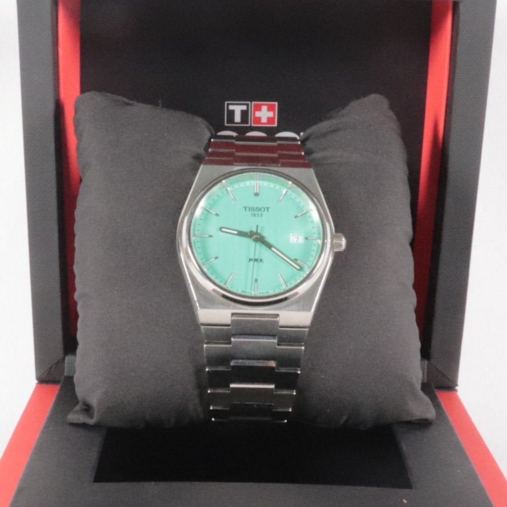Tissot PRX 46MM Tiffany Blue | Full Set - Nette staat, Tissot, Gebruikt, Support@tissot.com, Rue Louis-Joseph Chevalier 1
2002 NeuchÃ¢tel
Switzerland