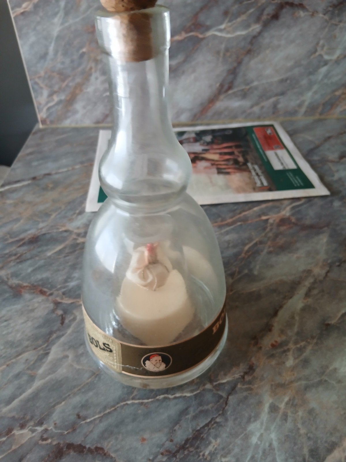 Bols ballerina wit, Ophalen