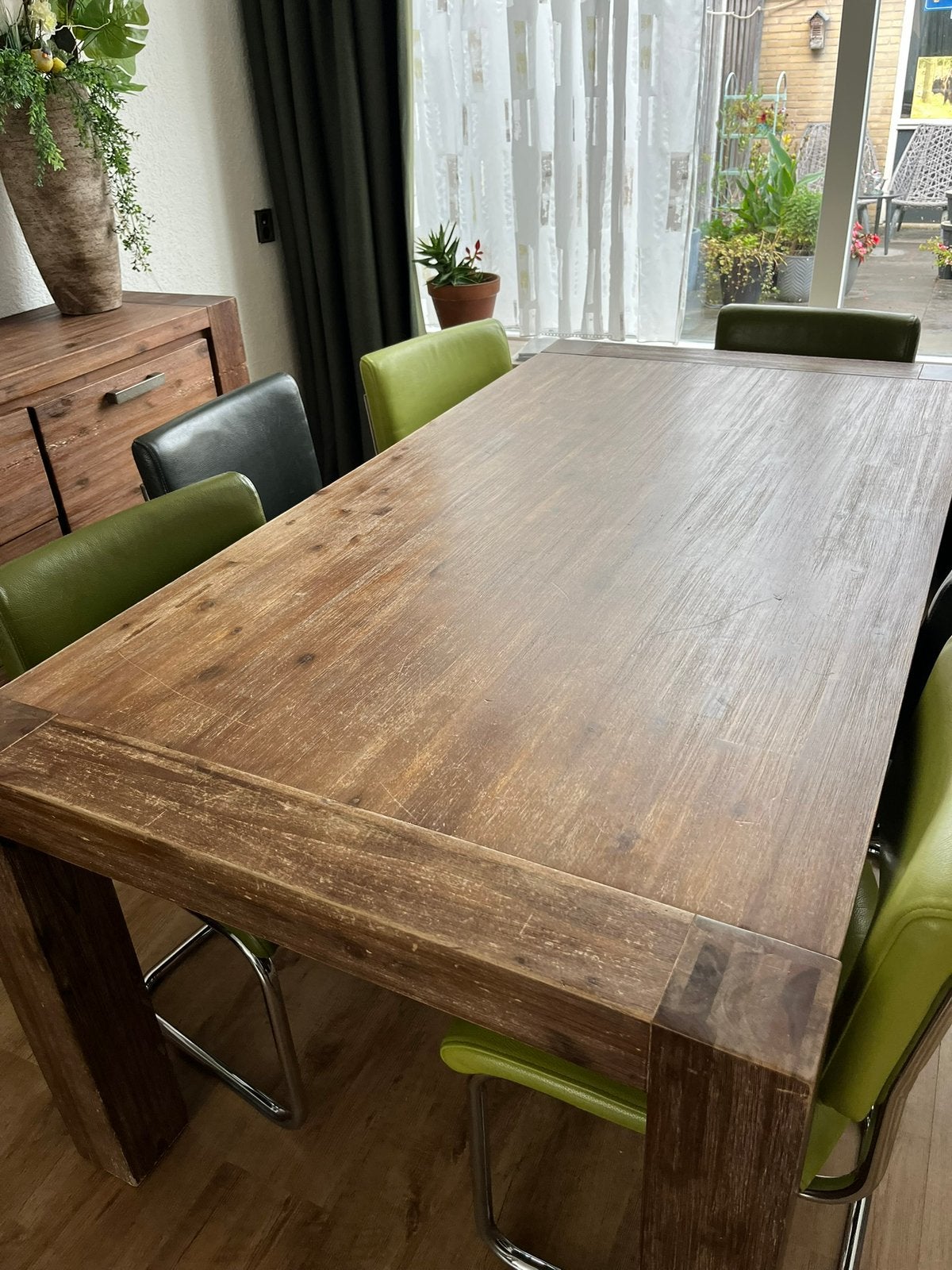 Foto 3 van Gratis uitschuifbare eet tafel met 6 leren stoelen