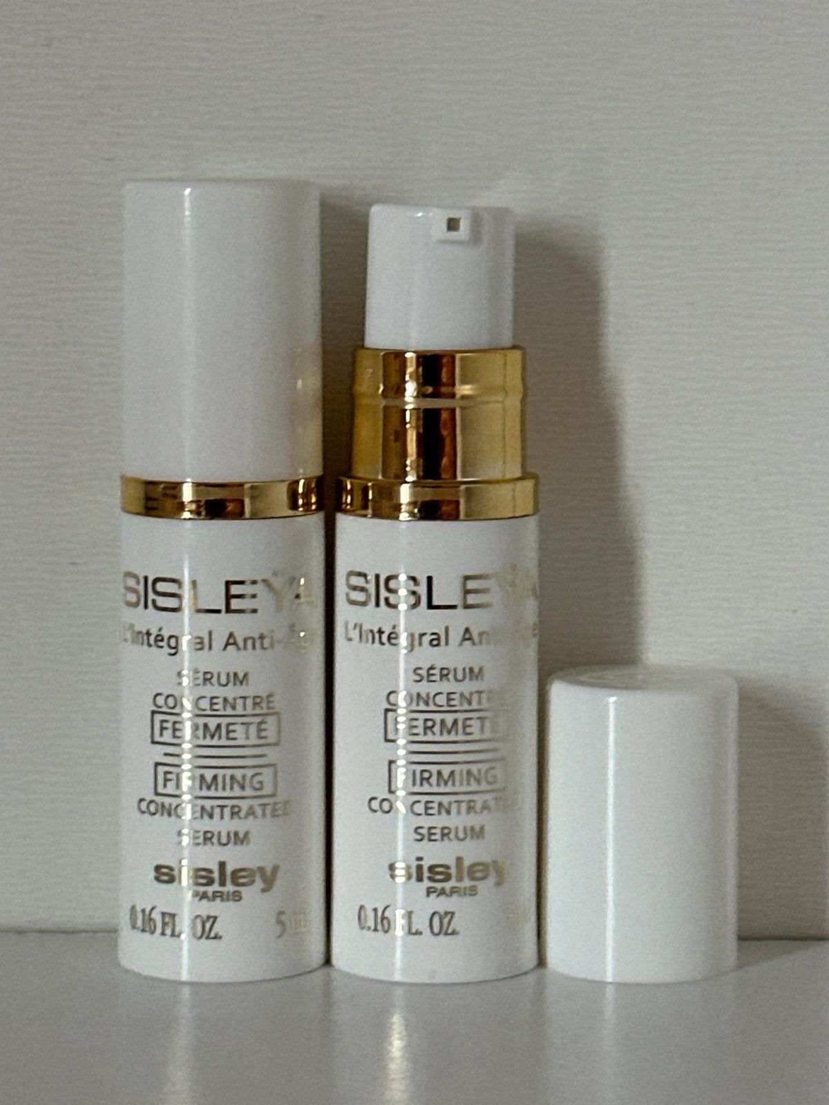 Sisley Sisleya L’integral Anti-Age Firming Serum 5 ml, Ophalen of Verzenden, Nieuw, Gehele gezicht, Verzorging