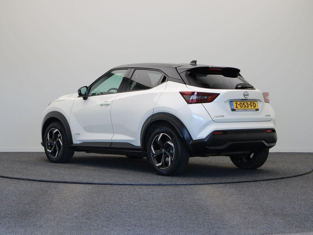 Nissan Juke 1.6 Hybrid N-Connecta | Adaptieve Cruis Control, Auto's, Nissan, Automatische klimaatregeling, 1300 kg, Gebruikt, Leder en Stof