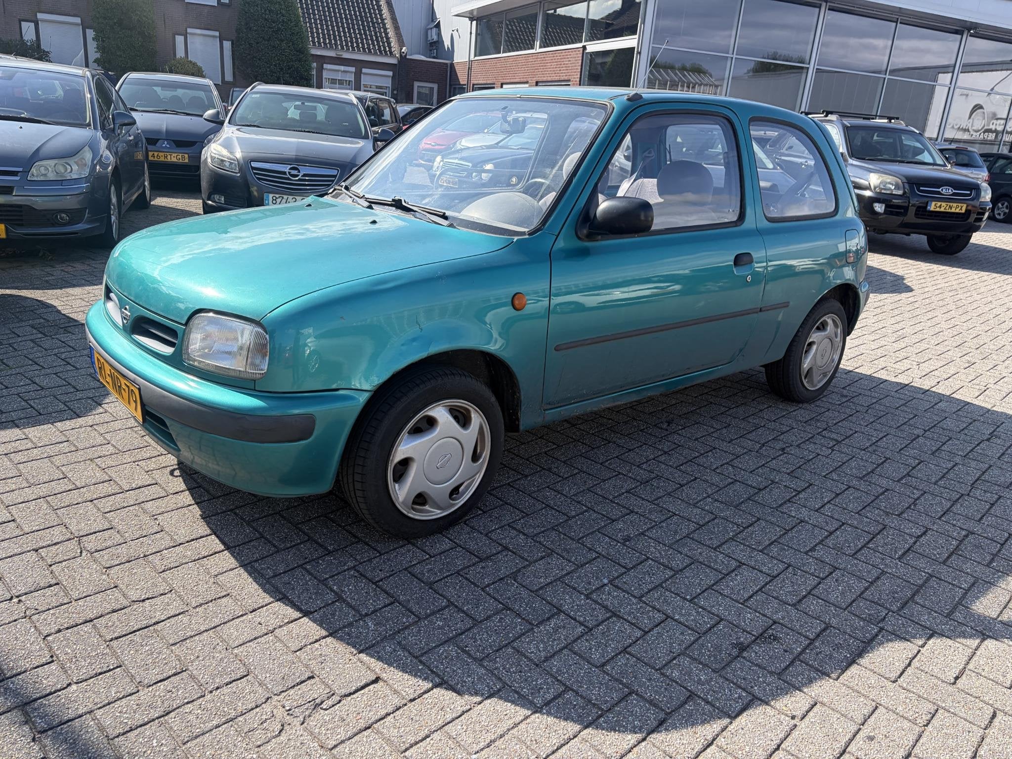 Nissan Micra 1.0 Automaat, Auto's, Stof, 4 cilinders, 800 kg, 450 kg