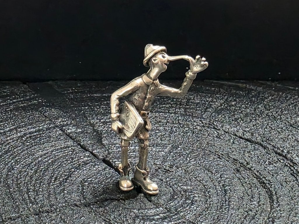 Zilveren Pinokkio beeldje - Vintage, Verzenden, Peter Pan of Pinokkio, Gebruikt, Beeldje of Figuurtje