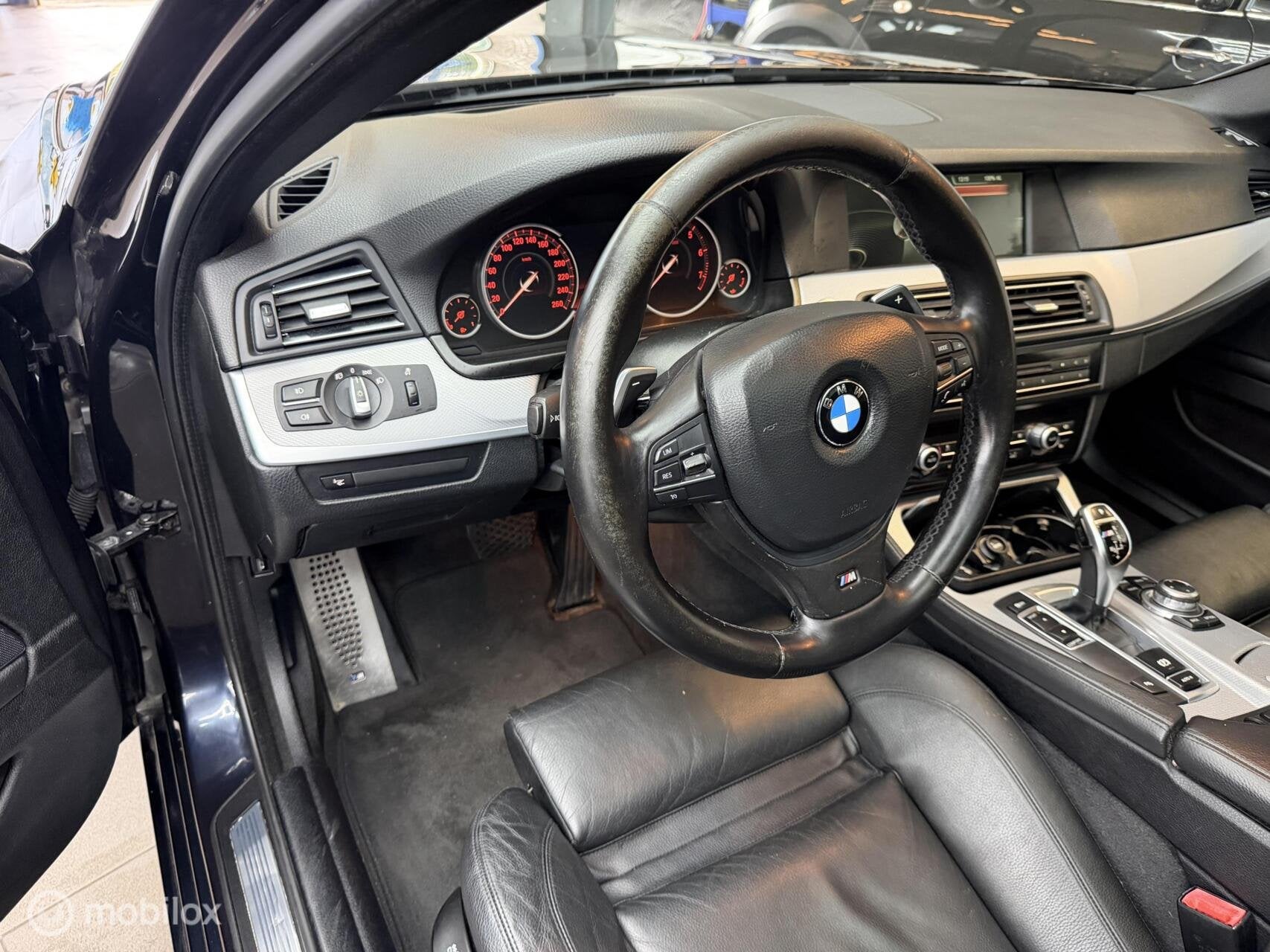 Foto 11 van BMW 5-serie Touring 520i High Executive
