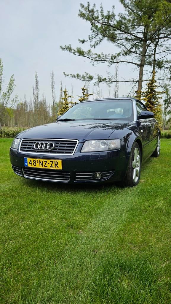 Audi A4 2.4 V6 125KW Cabrio 2004 Blauw, Auto's, Voorwielaandrijving, Cabriolet, A4, Bruin