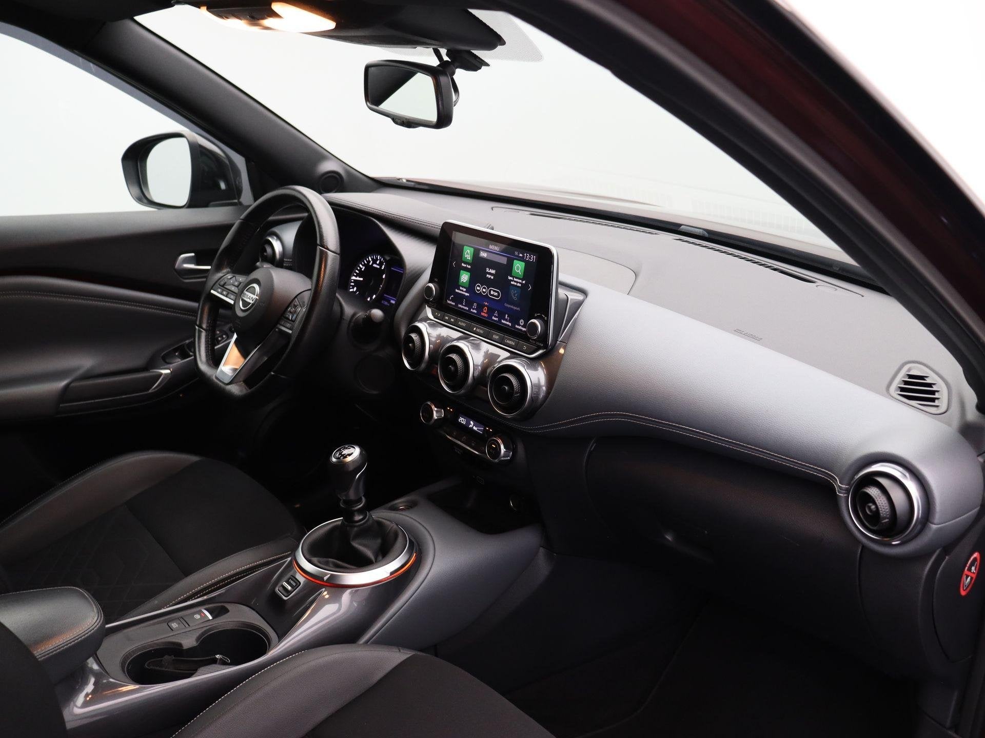 Foto 4 van Nissan Juke 1.0 DIG-T Tekna | Trekhaak | Stoelverwarming | B