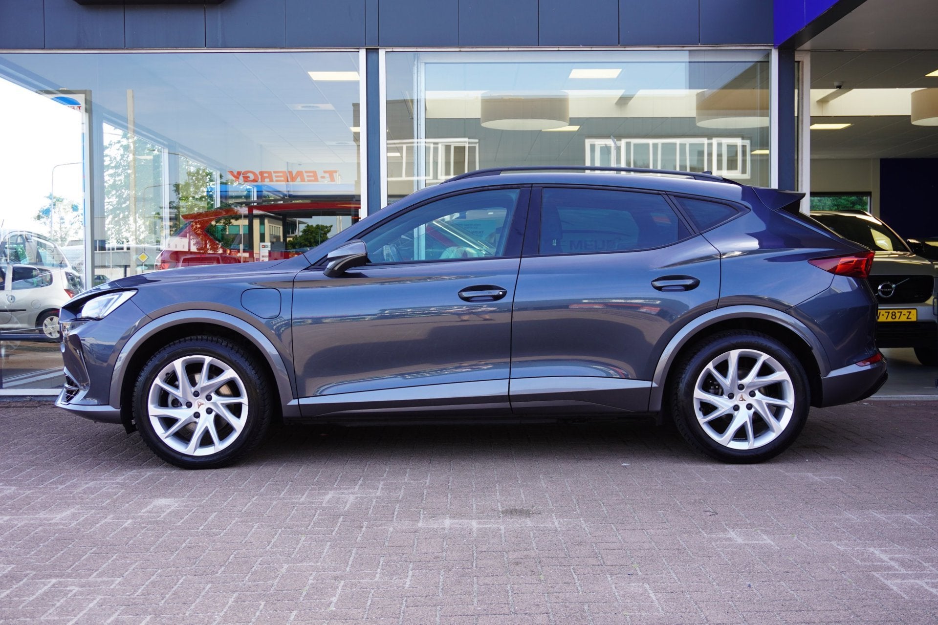 Cupra Formentor 1.4 e-Hybrid Business Automaat | Airco | Nav, Auto's, Dealer onderhouden, Gebruikt, 4 cilinders, Leder en Stof