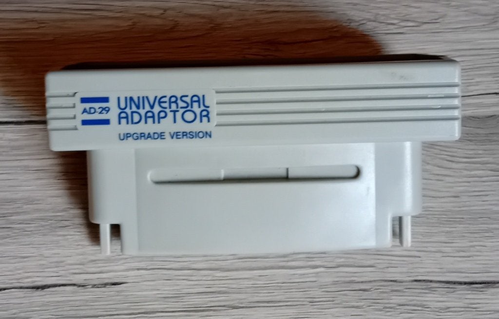 SNES AD-29 Universal Adaptor, Spelcomputers en Games, Ophalen of Verzenden, Gebruikt, Super NES
