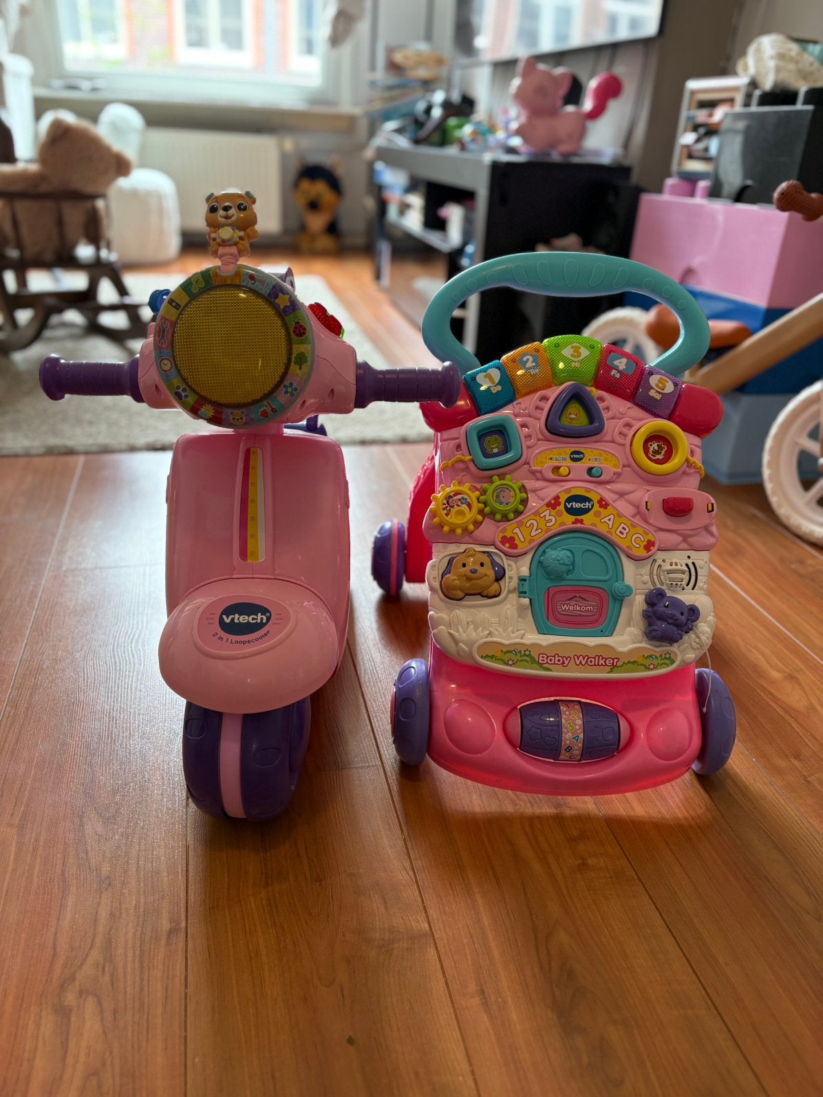Vtech 2in1 scooter en baby walker roze, Kinderen en Baby's, Speelgoed | Vtech, Ophalen of Verzenden, Zo goed als nieuw, 6 maanden tot 2 jaar