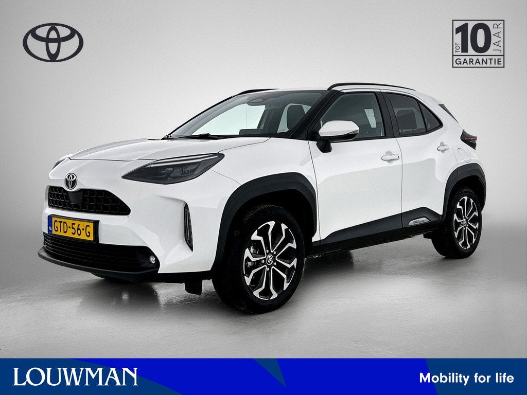 Toyota Yaris Cross 1.5 Hybrid 115 First Edition (bj 2024), Auto's, 12 maanden, Stof, Gebruikt, 116 pk