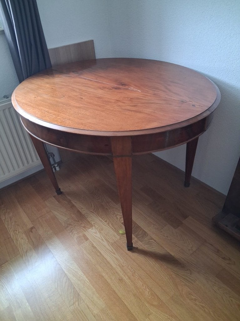 Empire antieke eetkamertafel, Ophalen