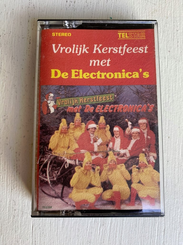 De Electronica's - Vrolijk Kerstfeest Met Cassettebandje, 1 bandje, Ophalen of Verzenden, Zo goed als nieuw, Origineel