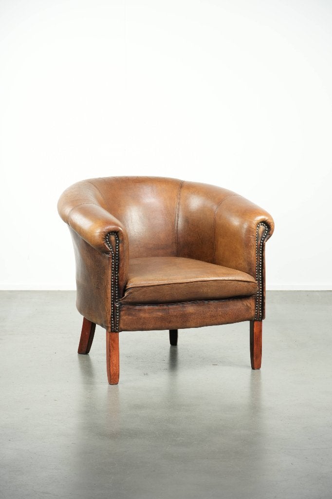Schapenleren clubfauteuil in een mooie bruine kleur, Huis en Inrichting, Ophalen, Gebruikt, Minder dan 75 cm, Vintage