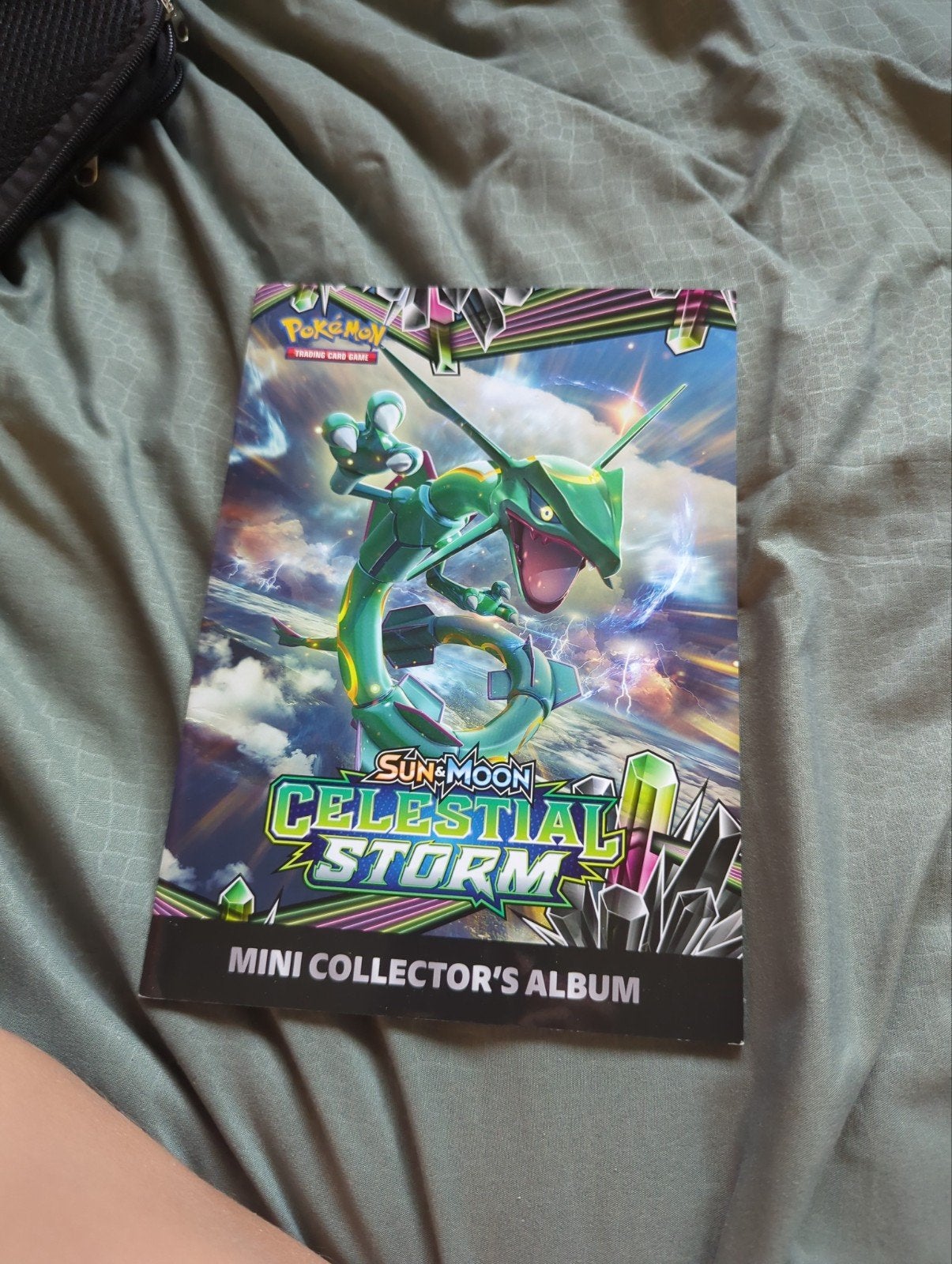 Pokémon Sun & Moon Celestial Storm Mini Collector's Album /, Ophalen of Verzenden, Zo goed als nieuw, Losse kaart, Foil