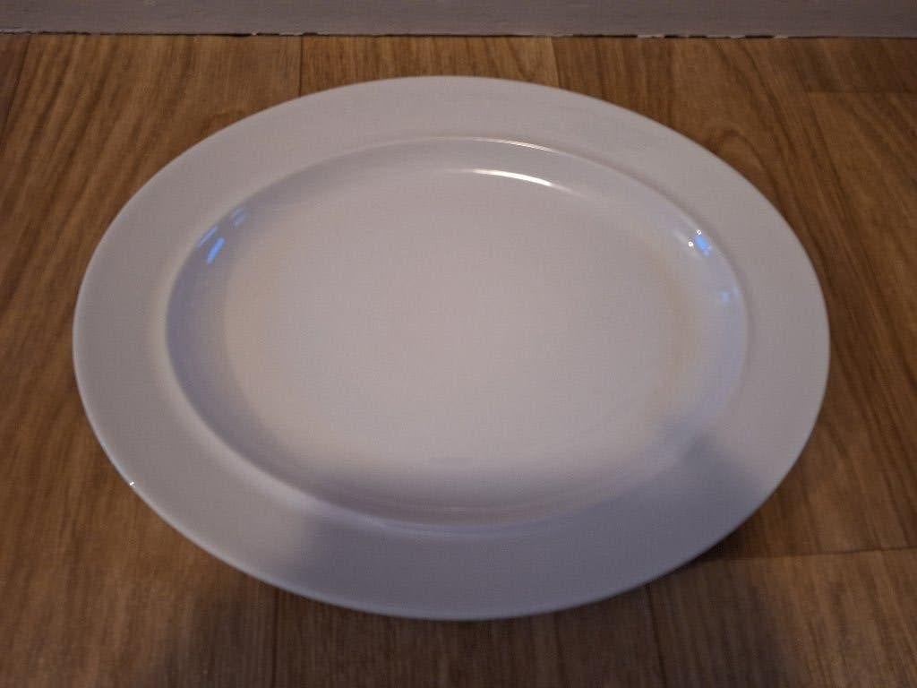 Ovale Alessi bord/schaal, Overige materialen, Ophalen of Verzenden, Zo goed als nieuw, Bord(en)