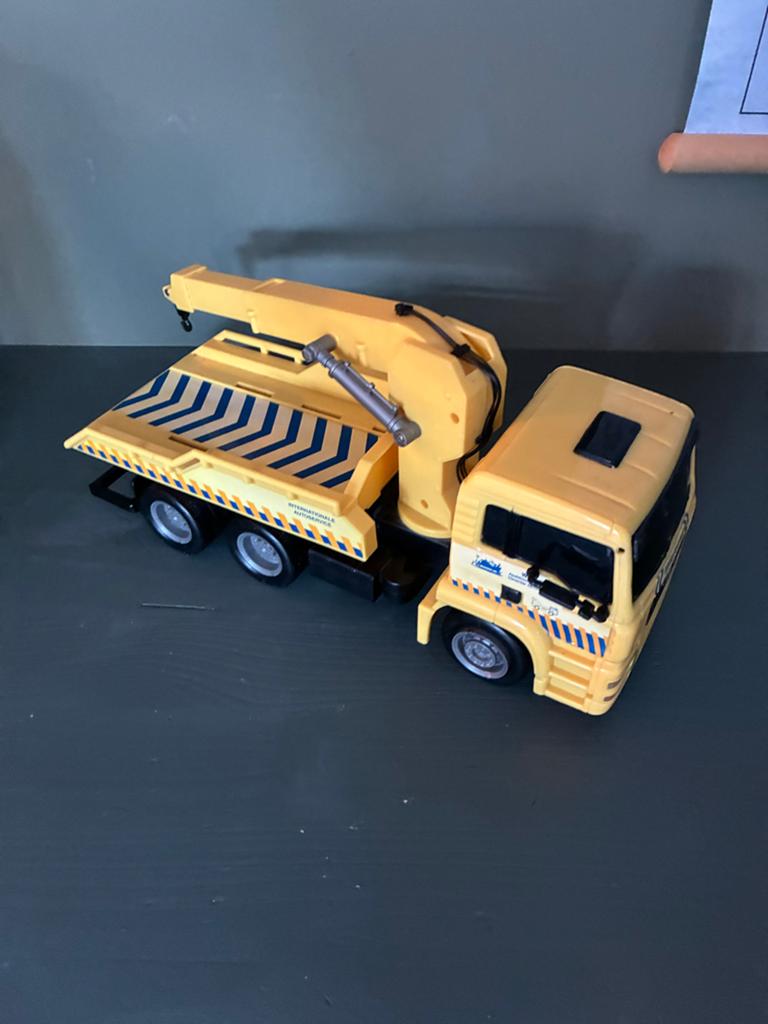 Gele speelgoed takelwagen met kraan, Ophalen, Gebruikt