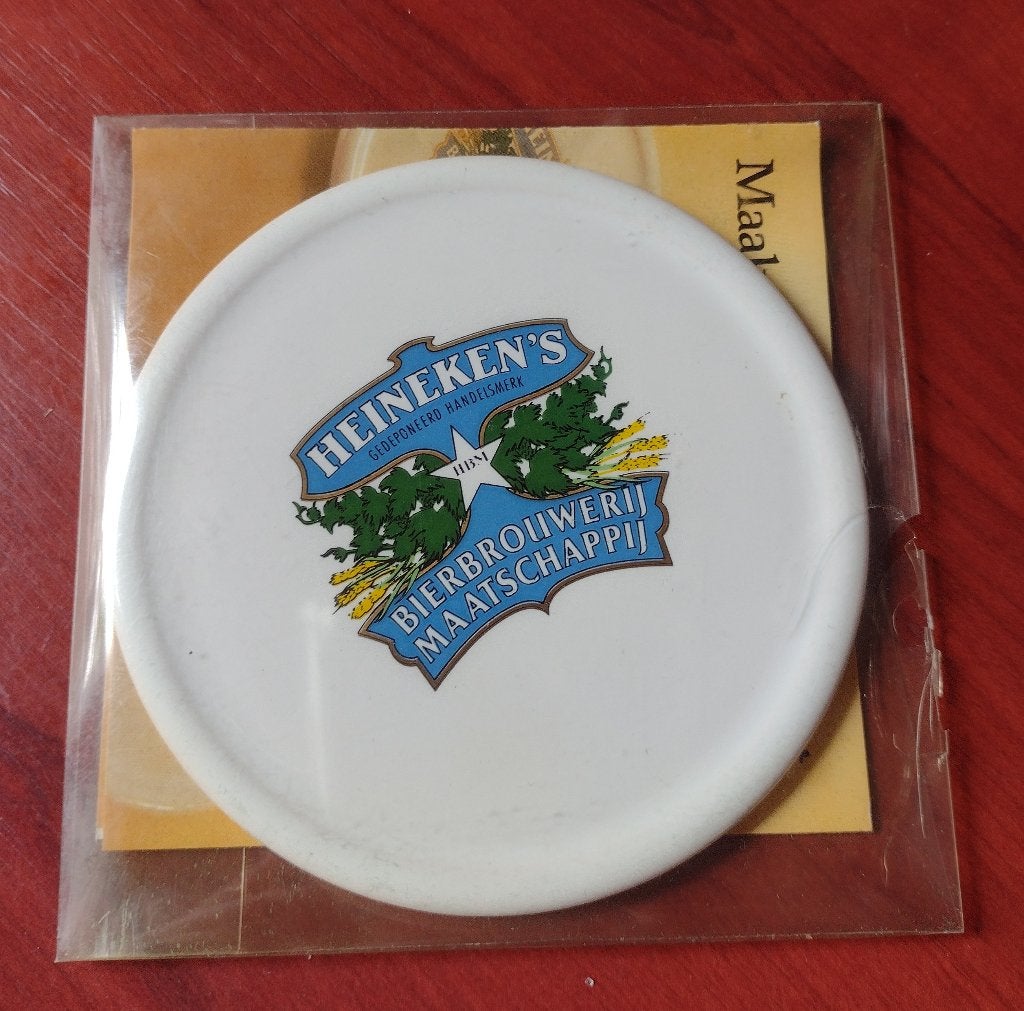 Heineken Vintage Coaster Porselein ‘70’s. (B), Verzamelen, Ophalen of Verzenden, Nieuw, Viltje(s), Heineken