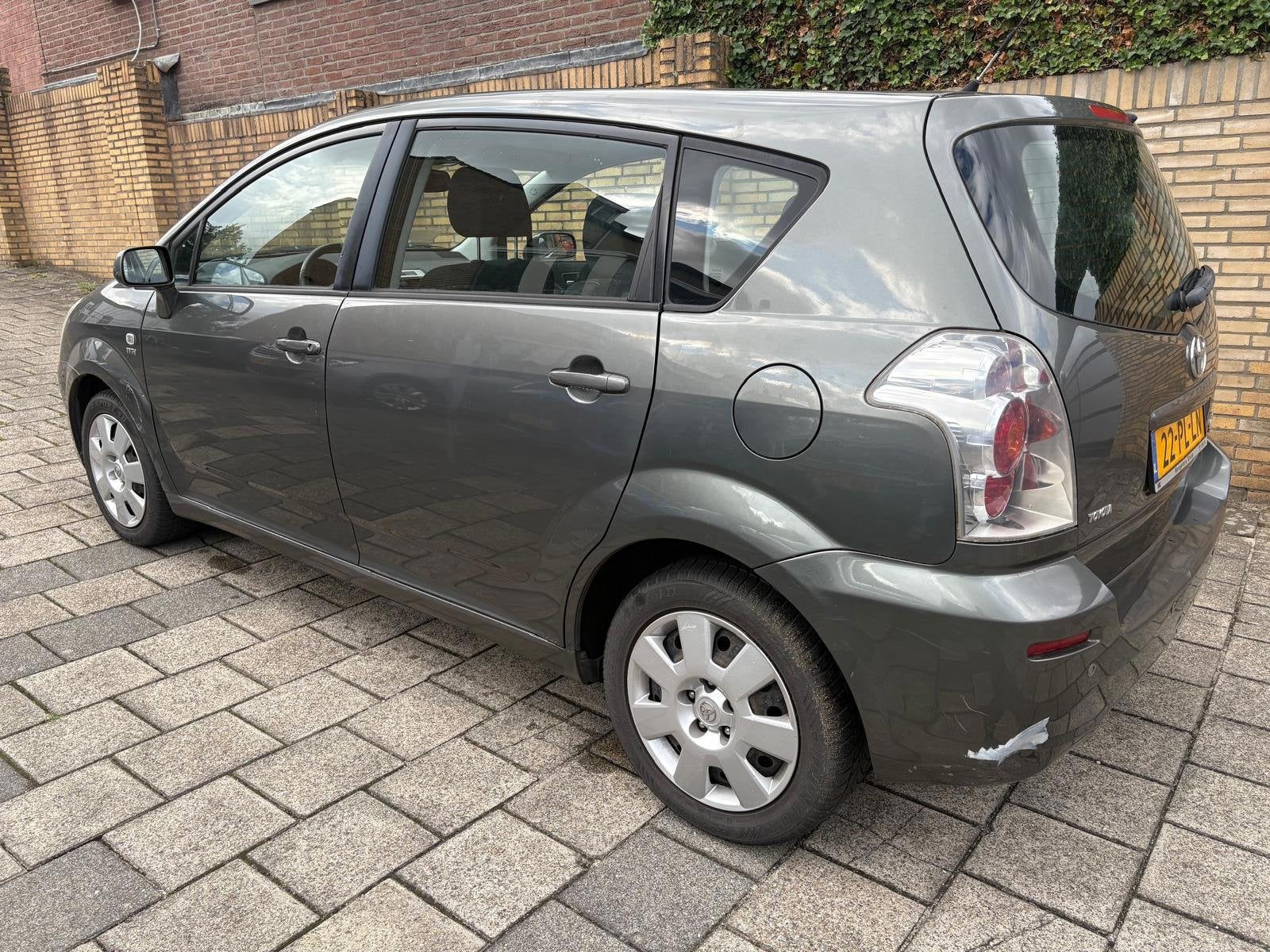 Toyota Corolla Verso 1.8 VVT-i Sol 7p., Auto's, Gebruikt, Zwart, 4 cilinders, 129 pk