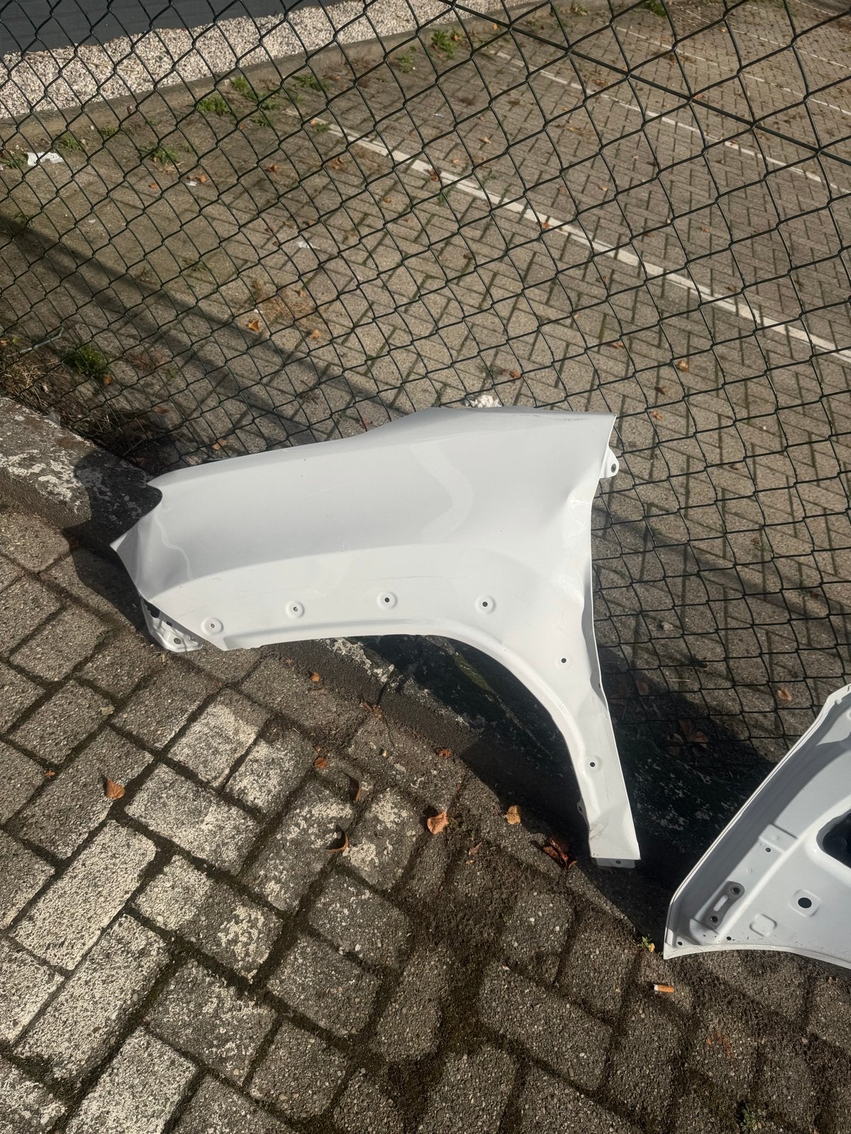 Spatbord links voor Toyota Yaris Cross, Gebruikt, Voor, Ophalen of Verzenden, Spatbord