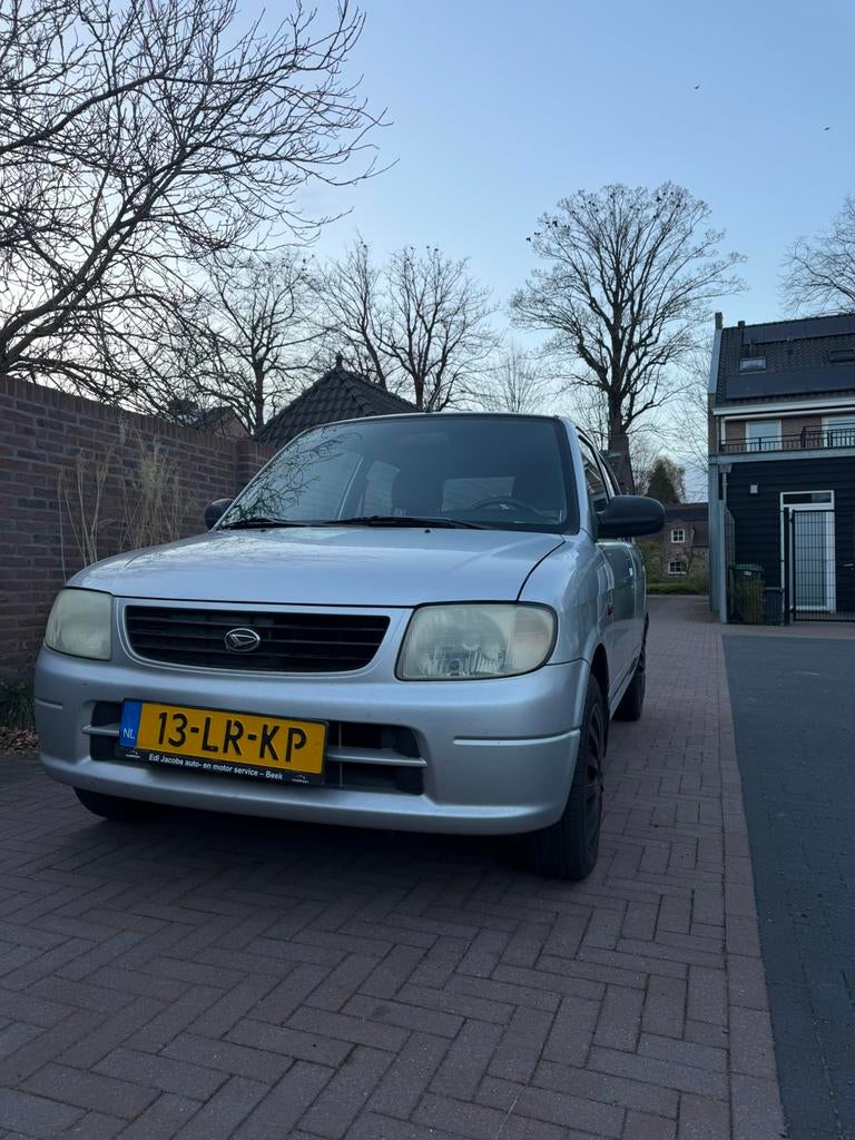 Daihatsu Cuore 1.0 STI 2003 Grijs, Auto's, Voorwielaandrijving, 600 kg, 4 stoelen, Cuore