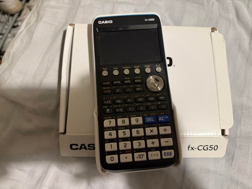 Casio FX-CG50 met doos en lader, Ophalen of Verzenden, Grafische rekenmachine, Zo goed als nieuw
