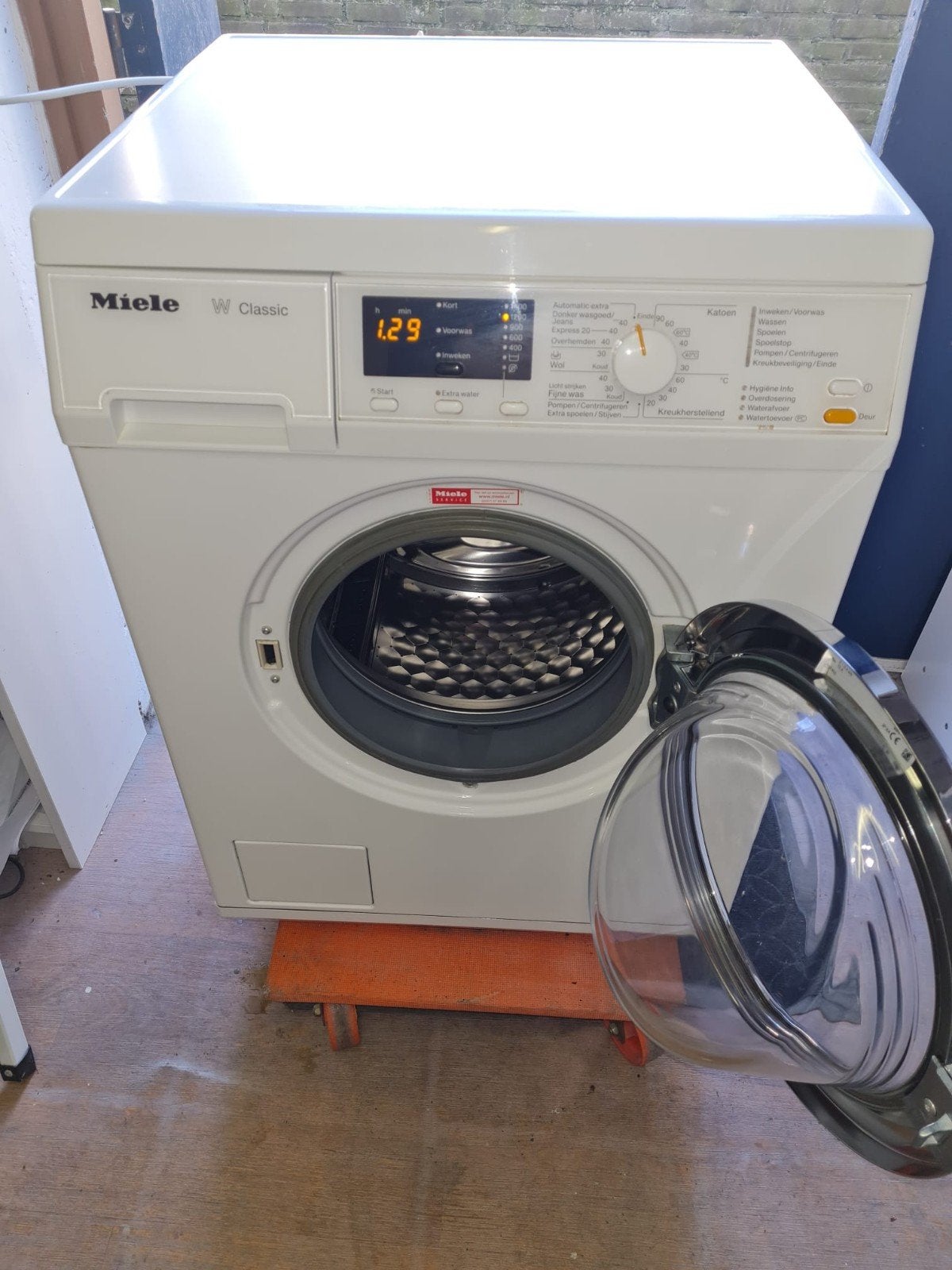 Wasmachine miele, Ophalen