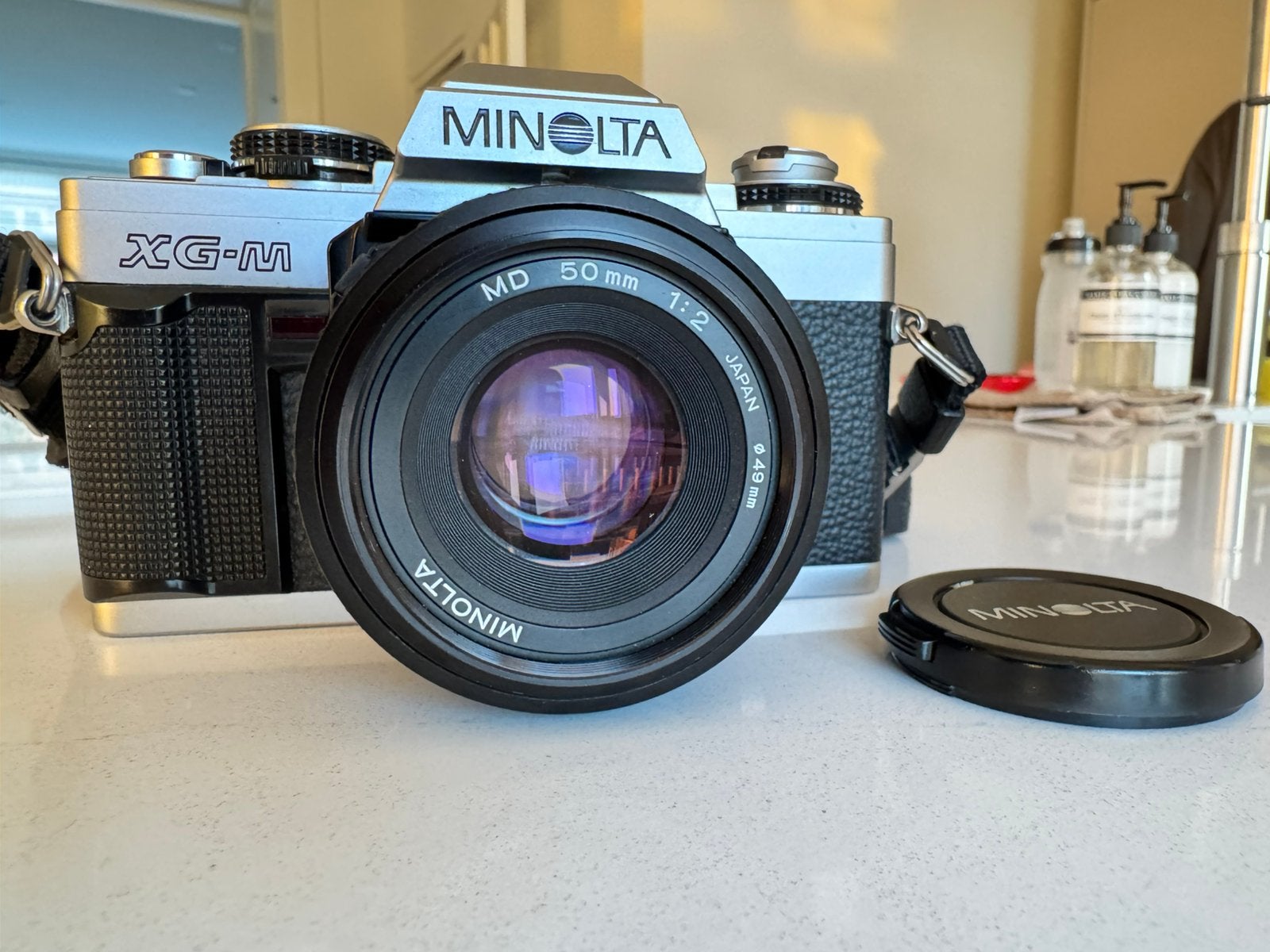Minolta XG-M — analoge spiegelreflexcamera, Audio, Tv en Foto, Fotocamera's Analoog, Ophalen of Verzenden, Gebruikt, Spiegelreflex