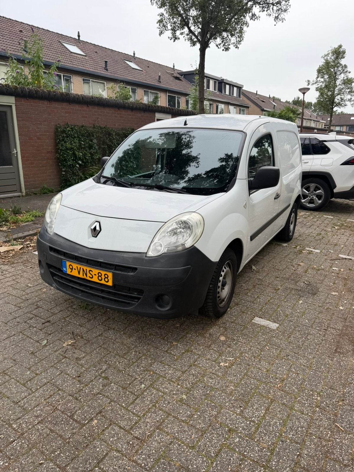 Renault Kangoo 1.5 DCI 80KW 2011, Auto's, Euro 5, Stof, Zwart, 4 cilinders