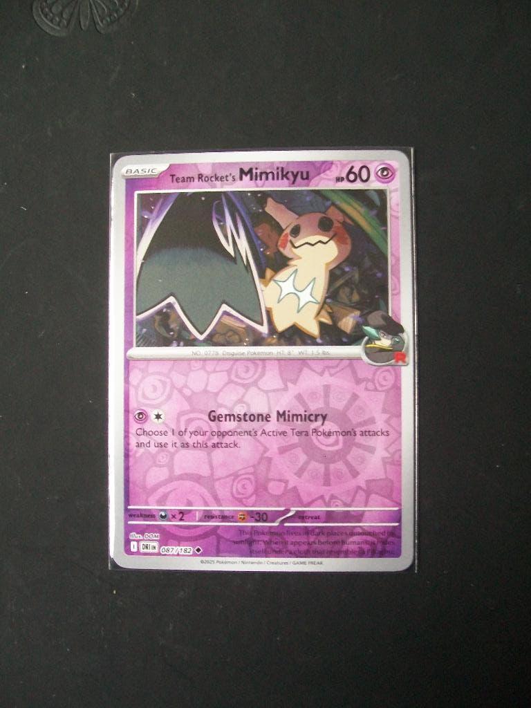 1202. Nieuwe Pokemon Kaart holofoil TEAM ROCKET's MIMIKYU, Verzenden, Nieuw, Losse kaart, Foil