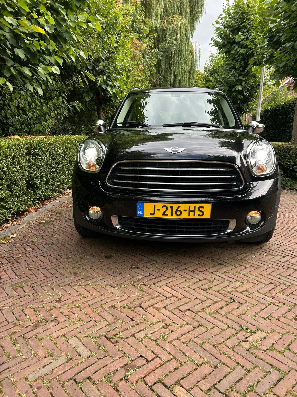 Mini Countryman 1.6 Cooper 2012 Zwart, Auto's, Voorwielaandrijving, Zwart, Leder en Stof, Particulier