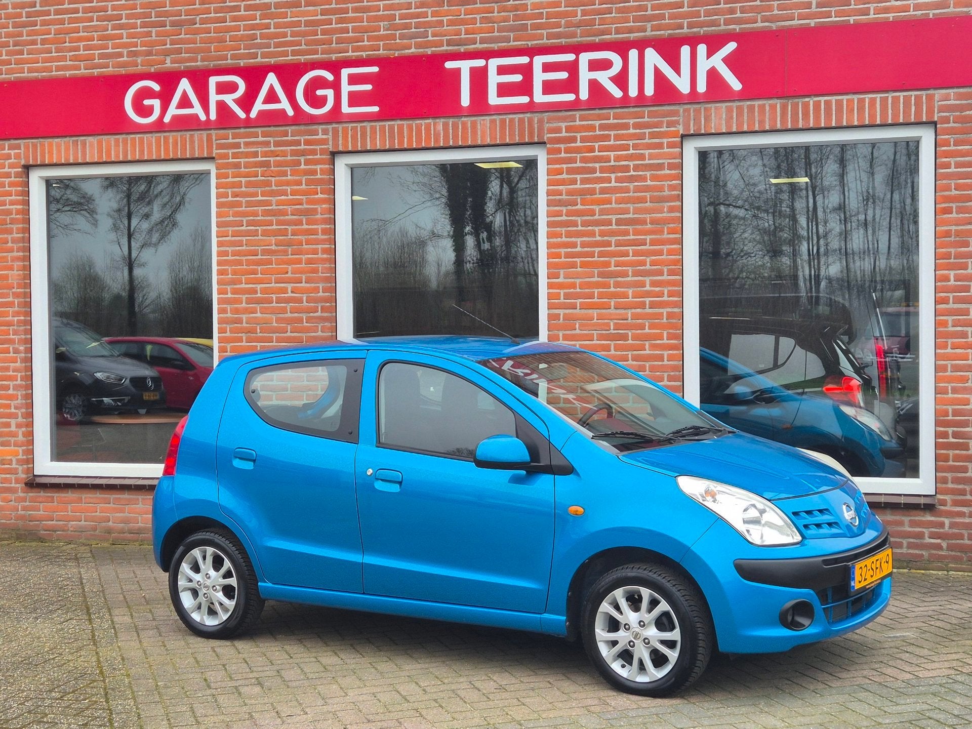 Nissan Pixo 1.0 Acenta 68PK 5drs airco, elektr.ramen, stuurb, Auto's, Nissan, Voorwielaandrijving, Euro 5, Stof, Gebruikt