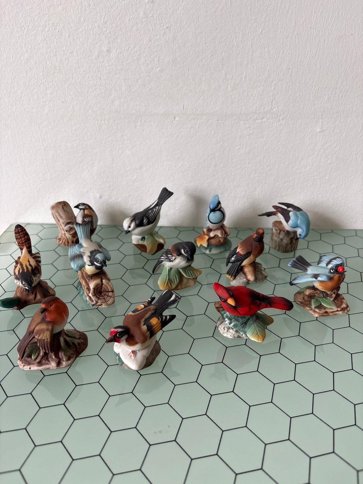 Verzameling van 12 porseleinen vogelbeeldjes, Ophalen of Verzenden, Zo goed als nieuw, Vogel, Beeldje of Figuurtje