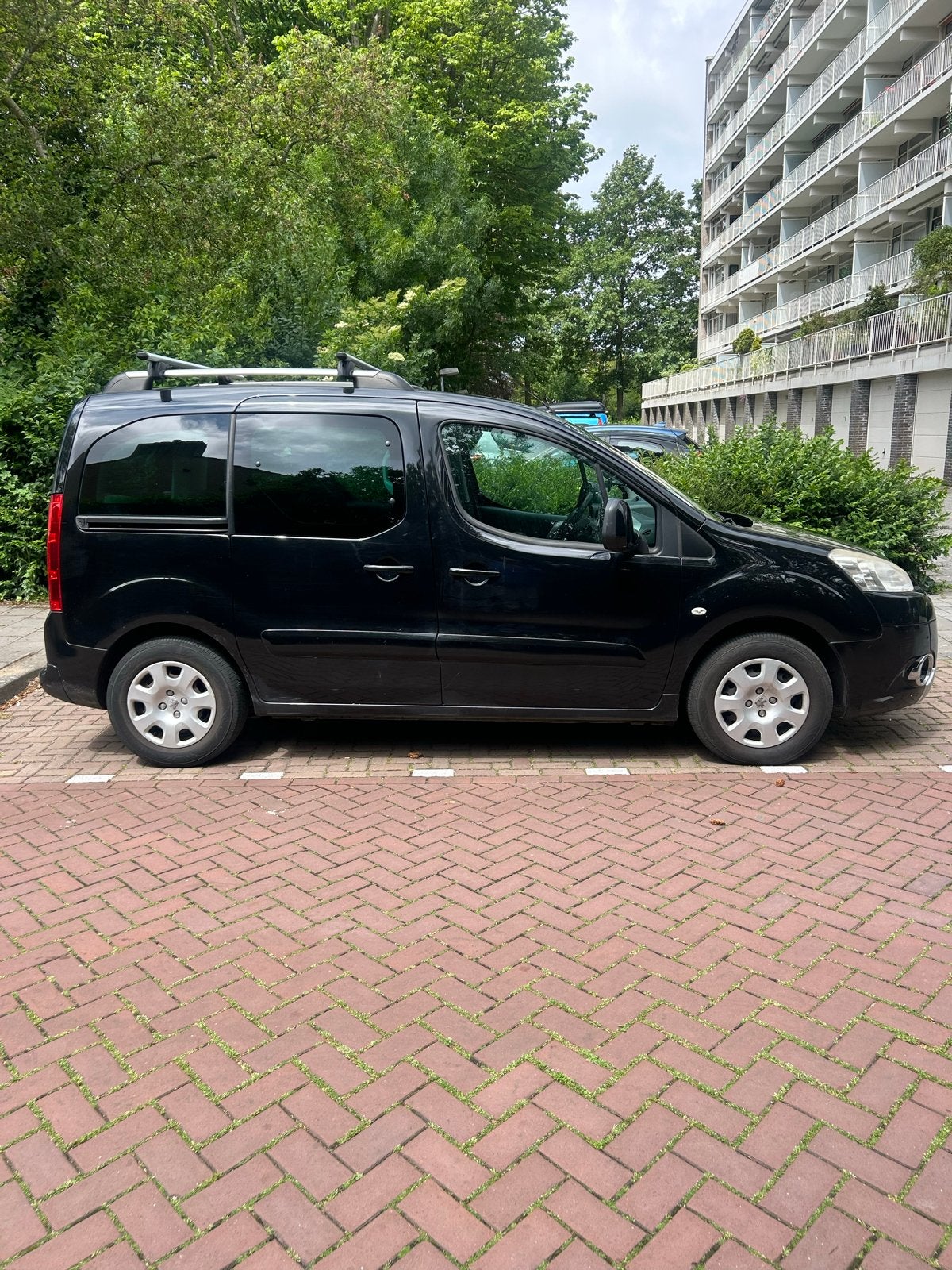 Peugeot Partner 1.6 72KW Tepee 5PL 2011 Zwart, Auto's, Peugeot, Voorwielaandrijving, 1380 kg, 4 cilinders, Zwart