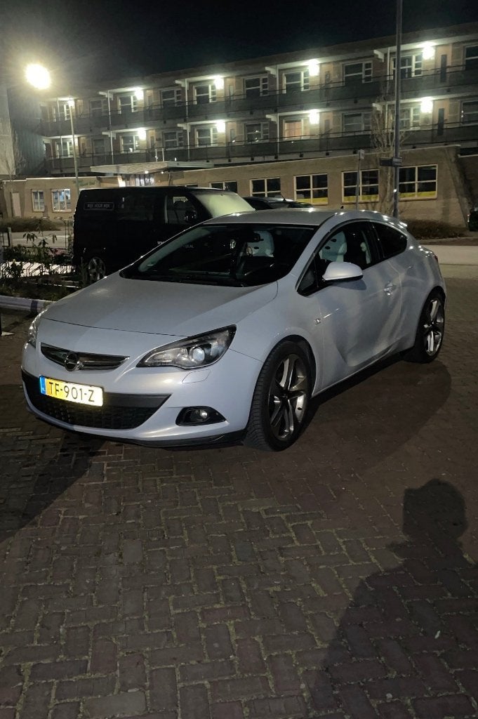 Opel Astra 1.6 T 180PK Ecotec 2011 Wit, Auto's, Zwart, 4 cilinders, 179 pk, Wit
