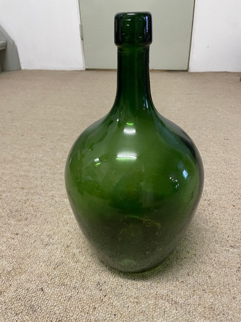 groene glazen gistfles, Ophalen